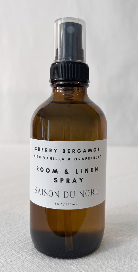 Amber glass spray bottle of natural Cherry Bergamot Room & Linen Spray